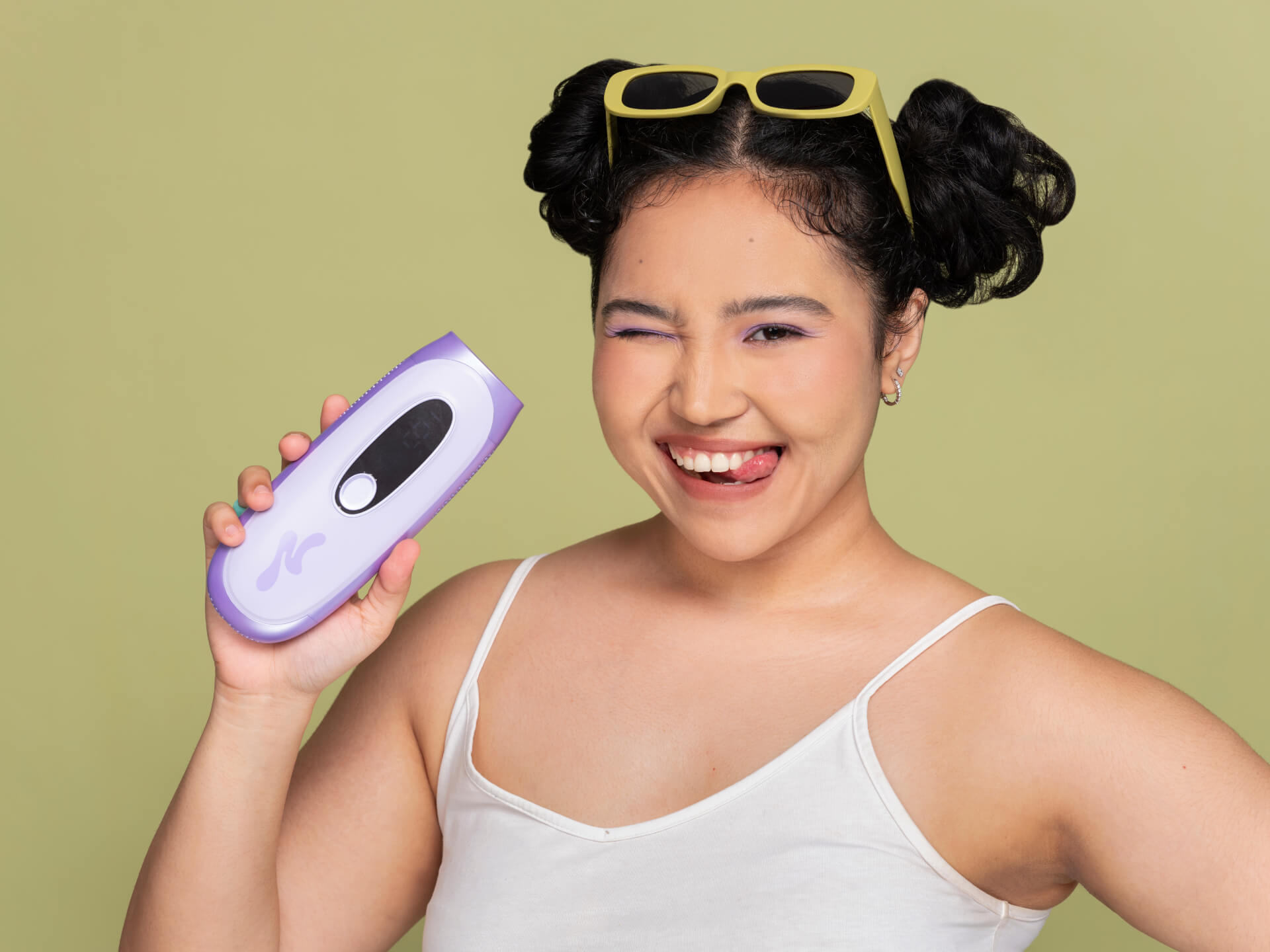 NUMIE Aura IPL hair removal device featuring FrostTouch cooling for painless, fast, and long-lasting results